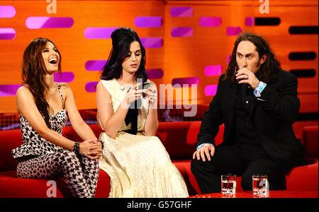 (Left - right) Cheryl Cole, Katy Perry and Ross Noble during filming of the Graham Norton show at the London Studios, London. Stock Photo