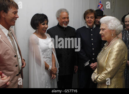 Queen Elizabeth II meets (left to right) Sir Cliff Richard, Dame Shirley Bassey, Sir Tom Jones and Sir Paul McCartney backstage at The Diamond Jubilee Concert outside Buckingham Palace, London. Stock Photo
