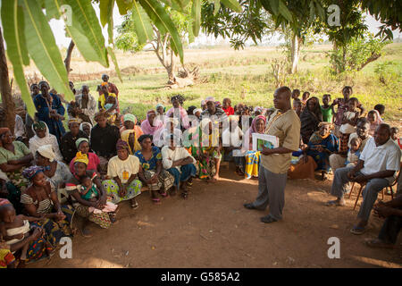 Residents in Bobo Dioulasso Department, Burkina Faso attend a village meeting. Stock Photo