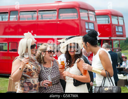 Racegoers enjoy a drink during Investec Ladies' Day of the Investec Derby Festival at Epsom Racecourse. PRESS ASSOCIATION Photo. Picture date: Friday June 1, 2012. See PA story RACING Epsom. Photo credit should read: Dominic Lipinski/PA Wireduring Investec Ladies' Day of the Investec Derby Festival at Epsom Racecourse. PRESS ASSOCIATION Photo. Picture date: Friday June 1, 2012. See PA story RACING Epsom. Photo credit should read: Dominic Lipinski/PA Wire Stock Photo