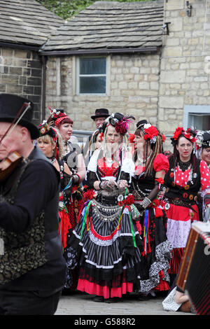 Members of 400 Roses dance troop waiting to dance in St George's Square, Hebden Bridge Stock Photo