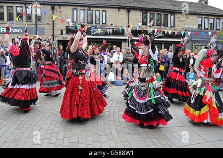 Members of 400 Roses dance troop dancing in St George's Square, Hebden Bridge Stock Photo