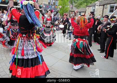 Members of 400 Roses dance troop dancing in St George's Square, Hebden Bridge Stock Photo