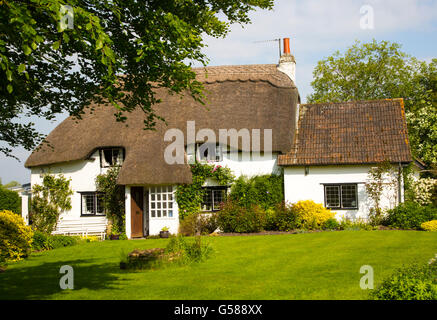 Pretty historic thatched cottage and garden, Cherhill, Wiltshire, England, UK Stock Photo