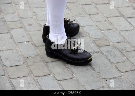 Morris dancer's feet, wearing wooden clogs Stock Photo