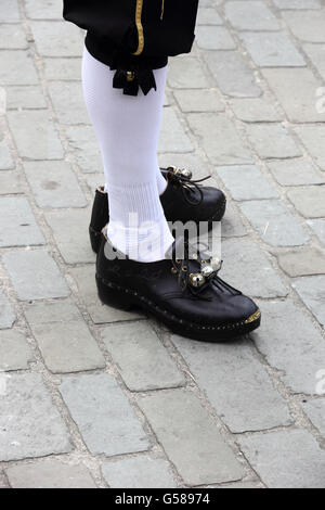 Morris dancer's feet, wearing wooden clogs Stock Photo