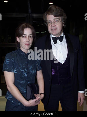Merlin Holland, grandson of Oscar Wilde with his partner Emma Wood, at the new British Library to open 'Oscar Wilde, a life in six acts'. It is the centenary anniversary of the Irish playwright and famous wit Oscar Wilde who died in Paris on 30th November, 1900. Stock Photo