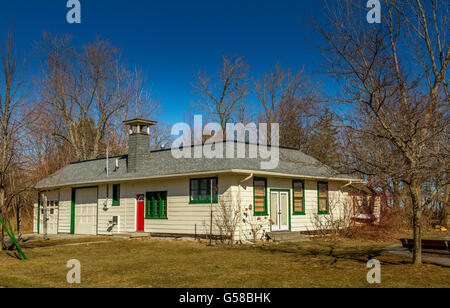 A rustic house on Centre Island, one of a of a small group of Islands just off of the Mainland and the City Of Toronto, Ontario, Canada Stock Photo