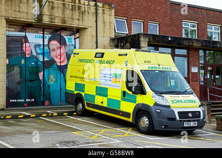 Ambulance parked outside fire station, England UK Stock Photo