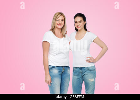 group of happy different women in white t-shirts Stock Photo