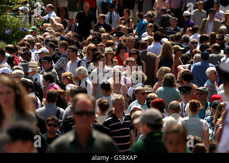 Tennis - 2012 Wimbledon Championships - Day Two - The All England Lawn Tennis and Croquet Club. Fans walk around the grounds during Day Two Stock Photo