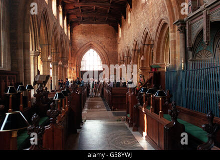 The scene this afternoon as visitors wait to sign 'the book of condolence' (Monday) at The church of Virgin Mary and St. Paul in Gt. Brington near Althorp where Princess Diana will be buried in the family crypt on Saturday. Stock Photo