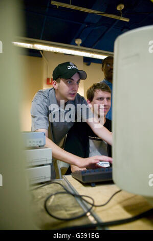 Organizers of the 6th edition of HOPE, an annual hackers' convention, work on setting up a network, July 22nd 2006, New York Cit Stock Photo