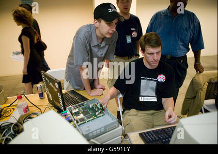 Organizers of the 6th edition of HOPE, an annual hackers' convention, work on setting up a network, July 22nd 2006, New York Cit Stock Photo