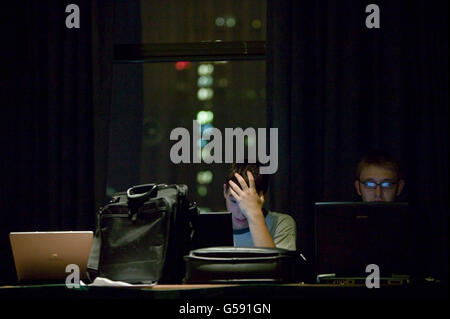 Attendees of the 6th edition of HOPE, an annual hackers' convention, spends time on their laptops, July 22nd 2006, New York City Stock Photo