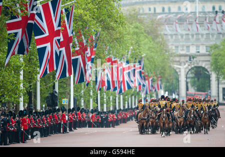 Troops parade along the Mall, during the annual Trooping the Colour parade, in central London. Stock Photo