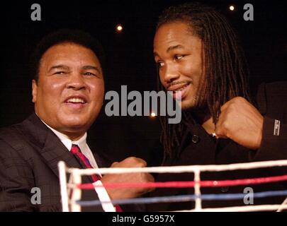 Former Heavyweight Champion Muhammad Ali (left) joins current Heavyweight Champion Lennox Lewis at the launch of the video game 'Knockout Kings 2001', designed for the Playstation2 console and due for release in March 2001, in London. *17/01/02: Ali celebrates his 60th birthday. Stock Photo