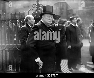 Prime Minister Winston Churchill leaving Westminster Abbey, London, after the memorial service to the former Prime Minister David Lloyd George. Stock Photo