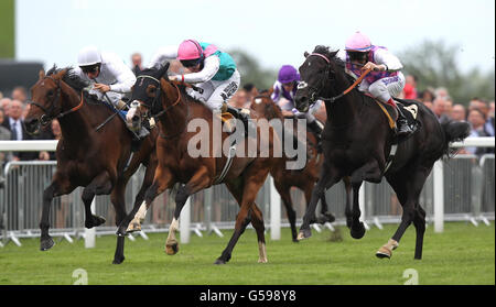 Thomas Chippendale ridden by Johnny Murtagh (No.6- right) heads Noble Mission ridden by Tom Queally (centre) and Thought Worthy ridden by Frankie Dettori (left) to win the King Edward VII Stakes during day four of the 2012 Royal Ascot meeting at Ascot Racecourse, Berkshire. Stock Photo