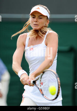 Slovakia's Daniela Hantuchova in action against USA's Jamie Lee Hampton during day one of the 2012 Wimbledon Championships at the All England Lawn Tennis Club, Wimbledon. Stock Photo