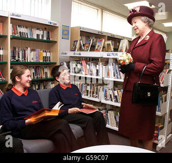 Queen Elizabeth II talking to students from the Carnegie Readers Medal Shaddowing Scheme, during her visit to the Special Educational Needs Unit and Learning Resource Centre, at Smithdon High School in Hunstanton, Norfolk. Stock Photo