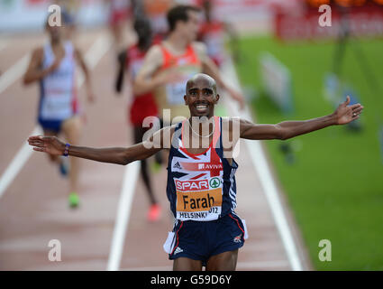 Great Britain's Mo Farah wins the Mens 5000m during day one of the 21st European Athletics Championships at the Helsinki Olympic Stadium, Helsinki. Stock Photo