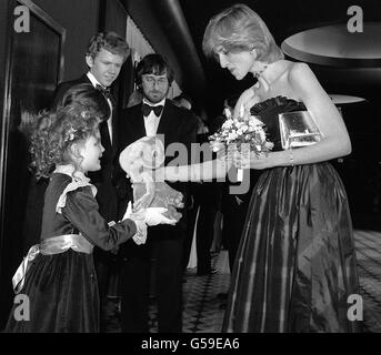 Drew Barrymore presents a cuddly toy to Princess Of Wales Stock Photo