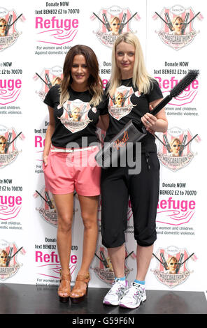 TV presenter Caroline Flack and Radio DJ Lauren Laverne at the final leg of The Benefit Cosmetics Mascarathon in Spitalfields, London, which raises funds and awareness for women's domestic violence charity Refuge. Stock Photo