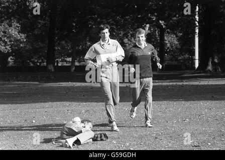 Athlete Sebastian Coe and Sports Minister Colin Moynihan, right, jogging in St James's Park in London, while launching a campaign against the use of drugs in sport. Stock Photo