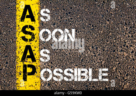 Concept image of Business Acronym ASAP As Soon As Possible written over road marking yellow paint line Stock Photo