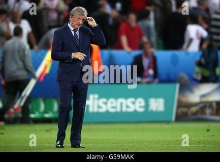 England manager Roy Hodgson looks dejected after the final whistle during the UEFA Euro 2016, Group B match at the Stade Geoffroy Guichard, Saint-Etienne. Stock Photo