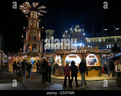 Night scene with people on Christmas Market in Manchester, England, United Kingdom Stock Photo