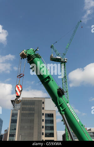 Construction tower cranes on site,Glasgow,Scotland,UK, Stock Photo