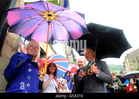 The Prince of Wales speaks with locals in Hebden Bridge, West Yorkshire, which was badly hit by the floods which devastated parts of West Yorkshire two weeks ago. Stock Photo