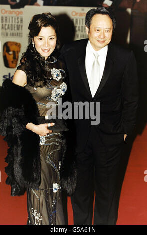 Actress Michelle Yeoh, who stars in the film Crouching Tiger, Hidden Dragon - which won four awards - with the film's director Ang Lee attending The Orange British Academy Film Awards at the Odeon cinema, in London's Leicester Square. Stock Photo