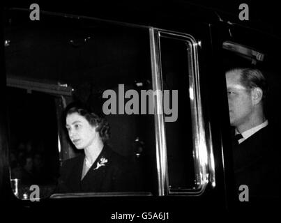 The new Queen, Elizabeth II (formerly Princess Elizabeth), returns to Clarence House, London, with the Duke of Edinburgh from London Airport after the sudden death of her father, King George VI. She succeeded the King on his death a day earlier. Stock Photo