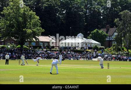 Spectators enjoy the cricket at Queens Park Chesterfield as Yorkshire bat against Derbyshire Stock Photo