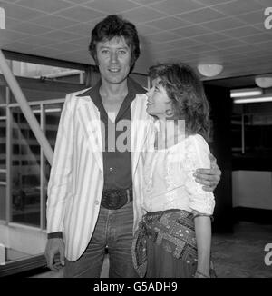 Actress Angharad Rees, accompanied by actor Robin Ellis, who were leaving for New York to promote the Poldark television series in the United States. Stock Photo