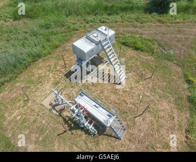 Equipment of an oil well. Shutoff valves and service equipment. Stock Photo