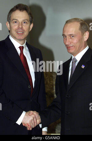 Russian President Vladimir Putin (right) shakes hands with British Prime Minister Tony Blair at the start of a bilateral meeting at the EU summit in Stockholm. Putin played down the diplomatic crisis with the U.S when pressed by journalists covering the summit. * The summit, hosted by Sweden who presently hold the 6-month rotating presidency, will focus on economic and social problems in Europe. Stock Photo