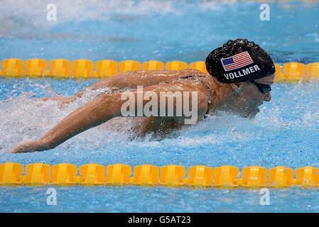 USA's Dana Vollmer on her way to winning gold and setting a new world record in the Women's 100m Butterfly Final at the Aquatics Centre, London, on the second day of the London 2012 Olympics. Stock Photo