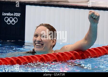 France's Camille Muffat celebrates winning gold in the Women's 400m Freestyle Final at the Aquatics Centre, London. Stock Photo