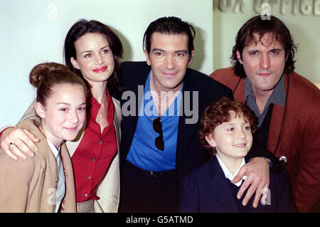 From left to right, Actors Alexa Vega, Carla Gugino, Antonia Banderas, Daryl Sabara and director Robert Rodriguez arrive for the premiere of the film 'Spy Kids' at the Odeon in London's west end. Spy Kids directed by Robert Rodriquez is a 'James Bond' for kids, filled with gadgetry and virtual reality. Stock Photo