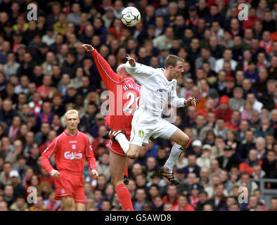 Leeds United's Lee Bowyer (right) challenges Liverpool's Gary McAllister to the ball during the FA Premiership match at Anfield, Liverpool. Stock Photo