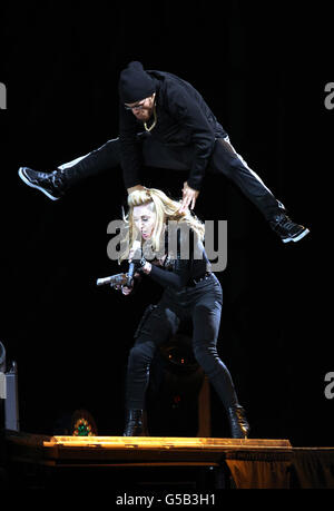 Madonna performs on stage in Hyde Park, London, as part of her MDNA tour. Stock Photo