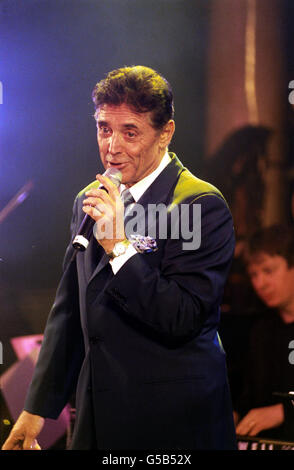 French singer Sacha Distel performing at the Cafe de Paris in ...