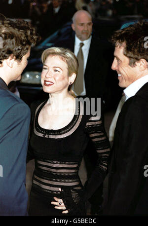 (L-R) Actor Colin Firth, actress Renee Zellweger and actor Hugh Grant, stars of the film 'Bridget Jones's Diary', arriving for its UK premiere at the Empire cinema, in London's Leicester Square. Stock Photo