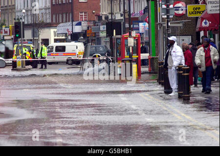 London Goldhawk road main burst. Water floods the street after a water main bursts in Goldhawk road, Shepherds Bush, London. Stock Photo