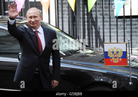 Russian President Vladimir Putin leaves 10 Downing Street in London today after a meeting with Prime Minister David Cameron. Stock Photo