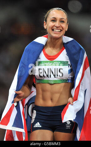 Great Britain's Jessica Ennis celebrates after winning gold in the Women's Heptathlon at the Olympic Stadium, London, on the eighth day of the London 2012 Olympics. Stock Photo